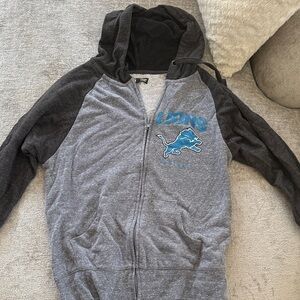 Gray and Dark Gray Distressed Detroit Lions Hoodie with blue glitter - Women’s M